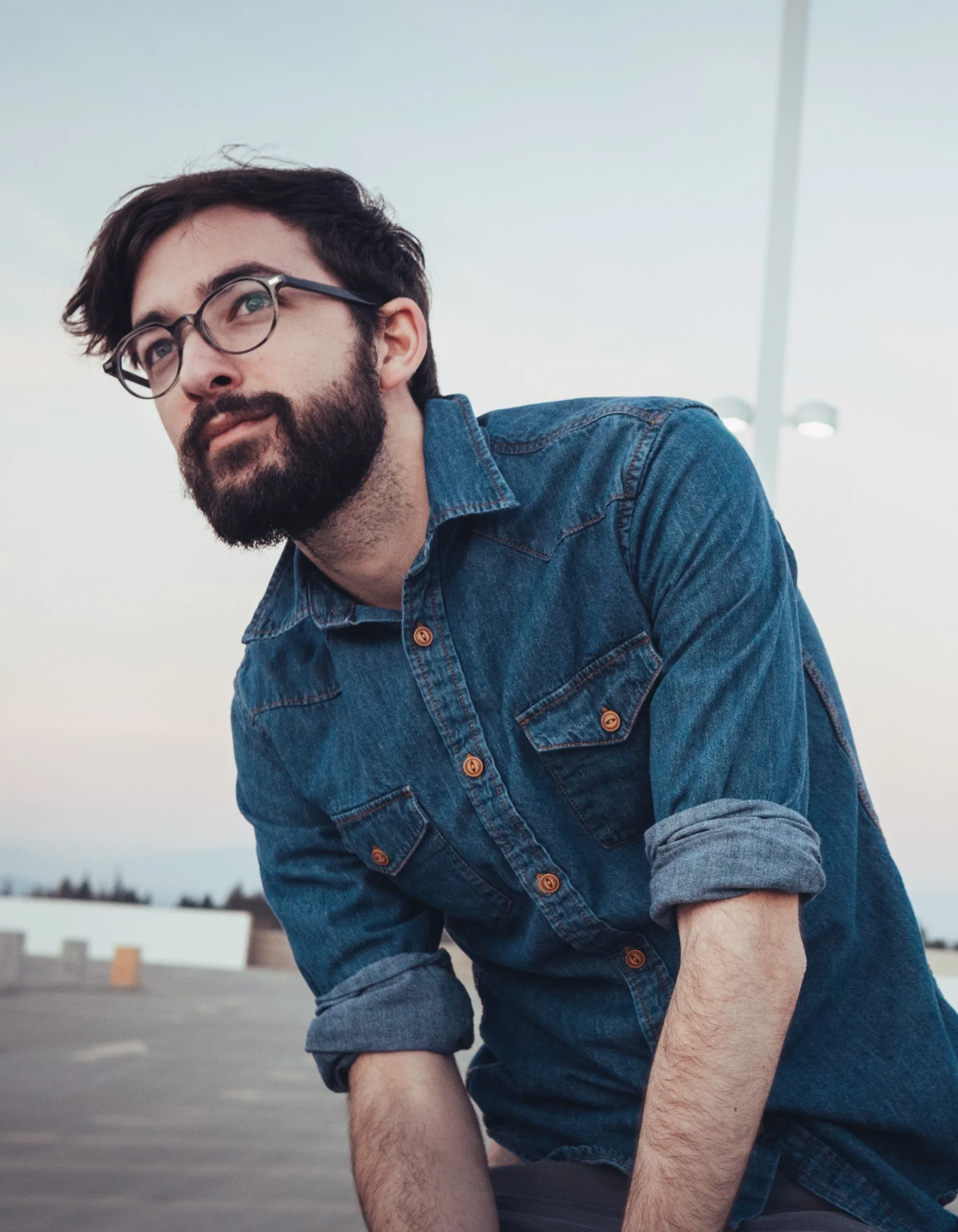Man with sleeves rolled Inside out