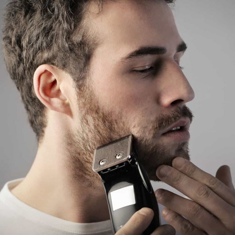 Man shaving beard