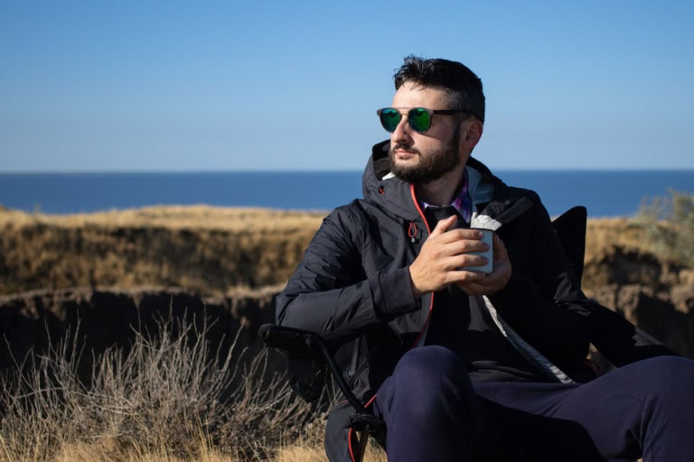 Man wearing black technical jacket