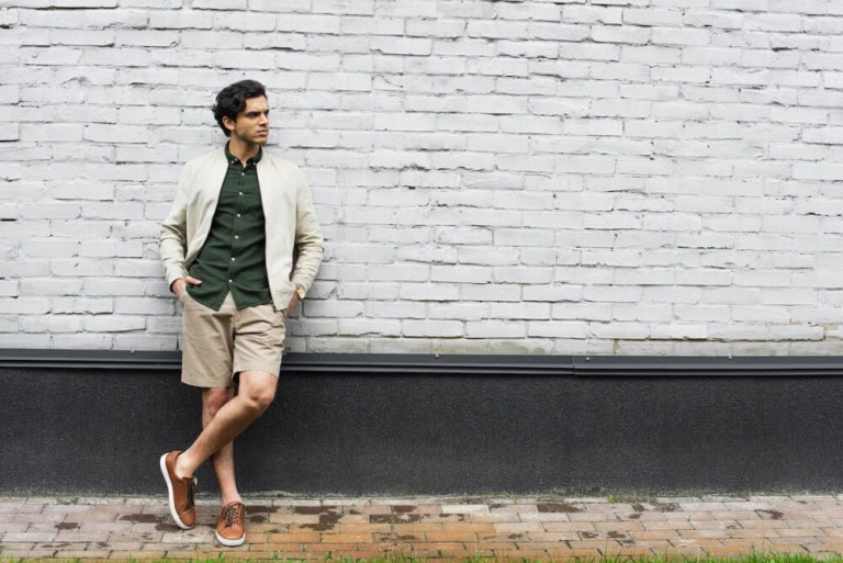 Young man standing in cool bomber jacket
