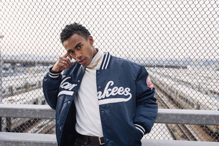 man wearing cool varsity jacket
