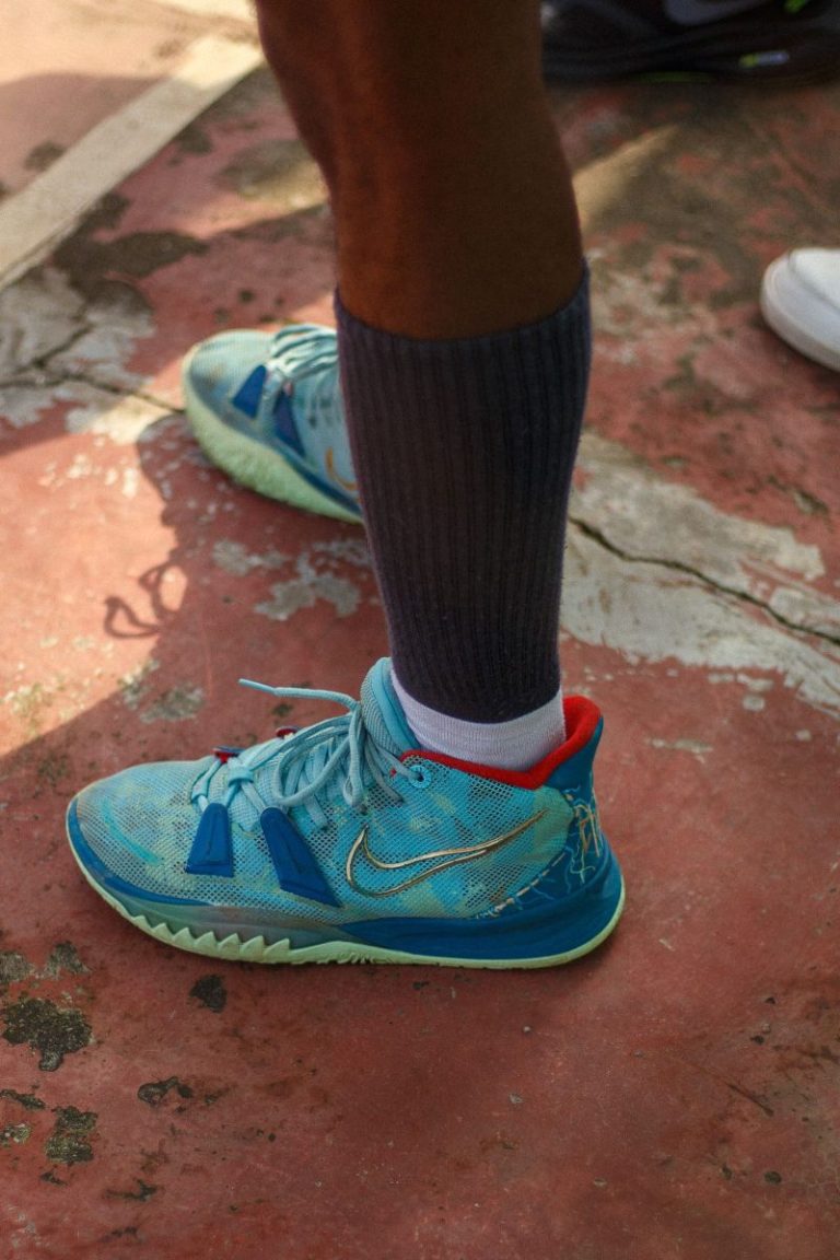 Colorful basketball sneakers on an outdoor court