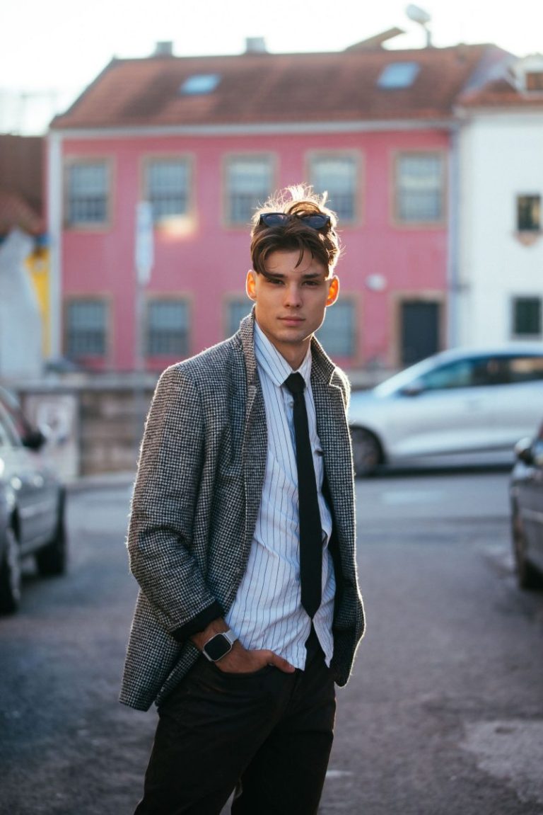 Fashionable young man in smart casual wear in the city