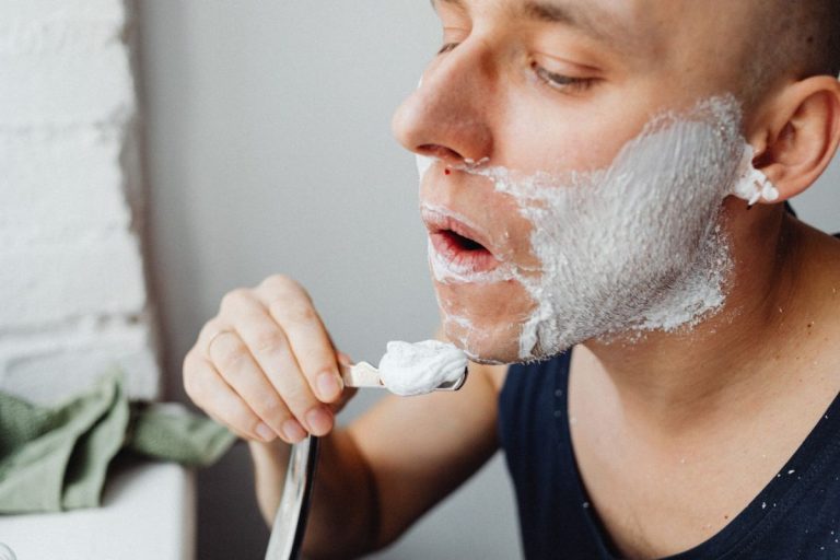 Man applying shaving cream with a brush